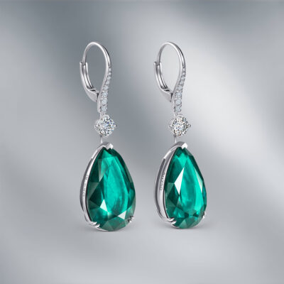 Diamond Earrings set with Pear Shape Emeralds